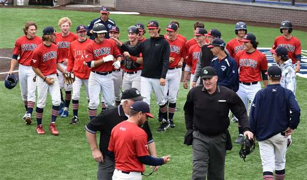 Medford Mustangs 2020 team celebrates with coaches