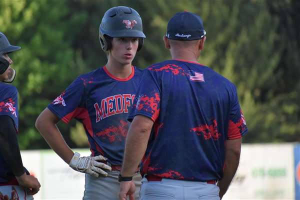 Medford Mustangs 2021 player with coach