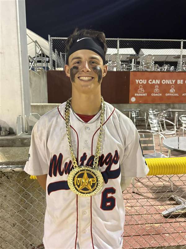 Medford Mustangs 2025 player with MVP chain