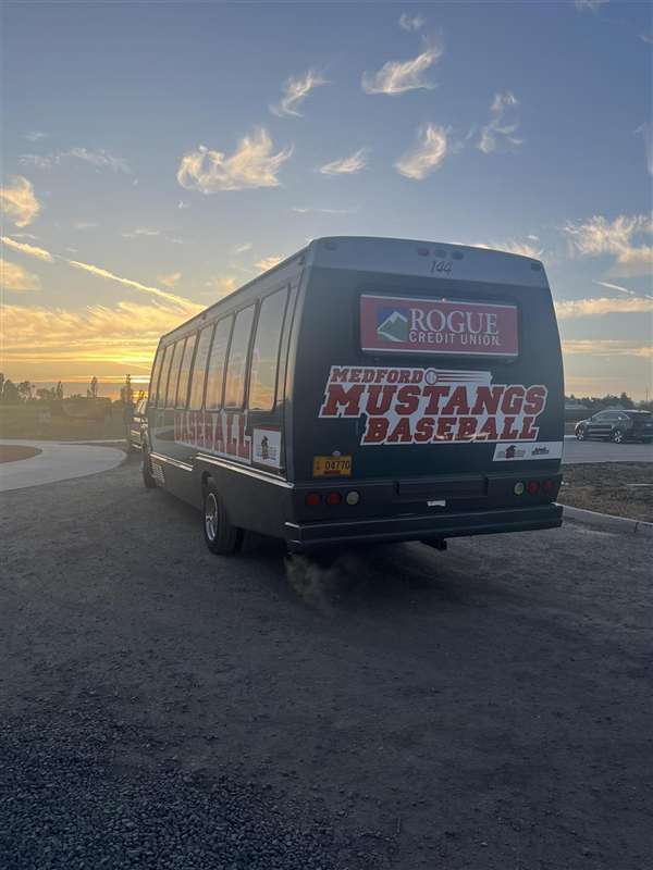Medford Mustangs 2025 team bus sunset